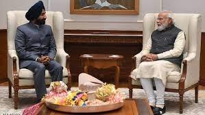 Prime Minister Narendra Modi and Satnam Singh Sandhu 